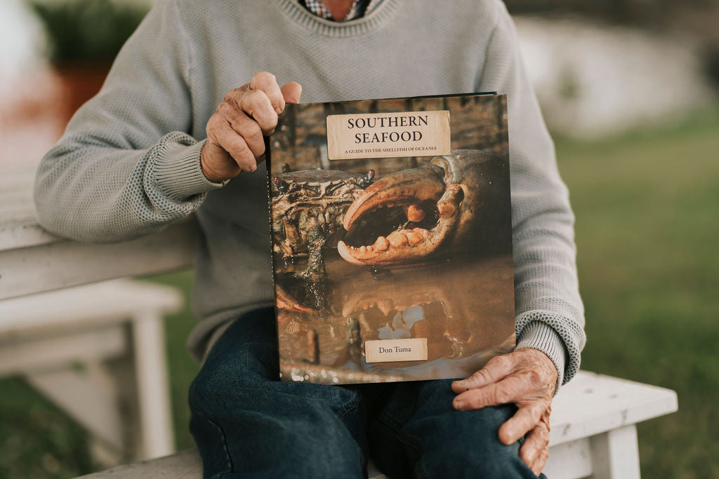 Don Tuma holding Southern Seafood